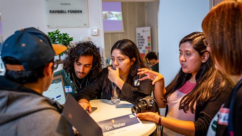 Five participants of Next Generation Water Action in deep discussions
