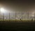 On the left are the traditional stadium lights on a football field and to the right are the new lights. Photo: Robert Anders